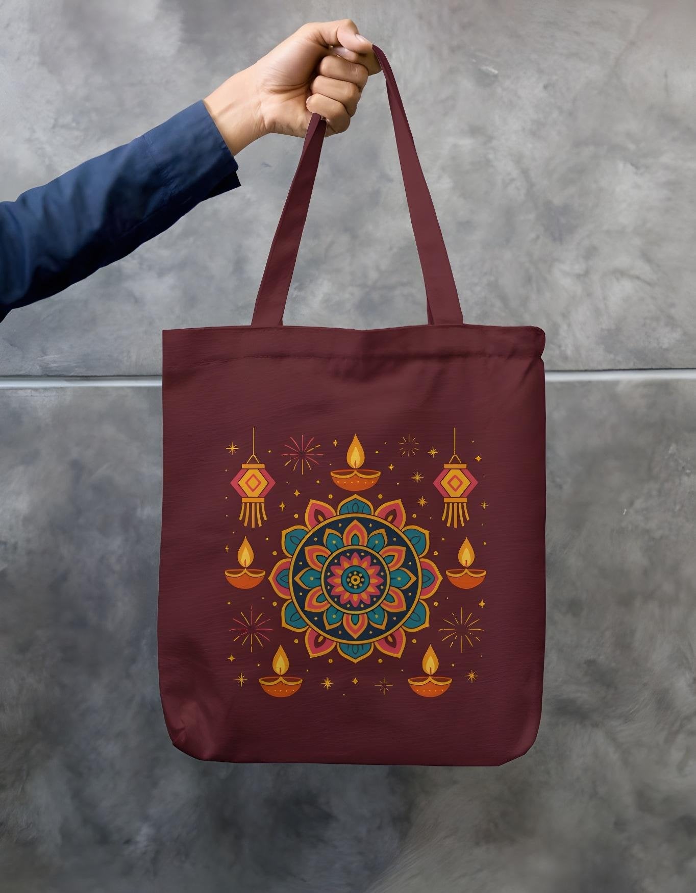 Maroon cotton canvas Diwali tote bag with elegant mandala and diya artwork, double side eco friendly print with secure zipper – sustainable carry bag.