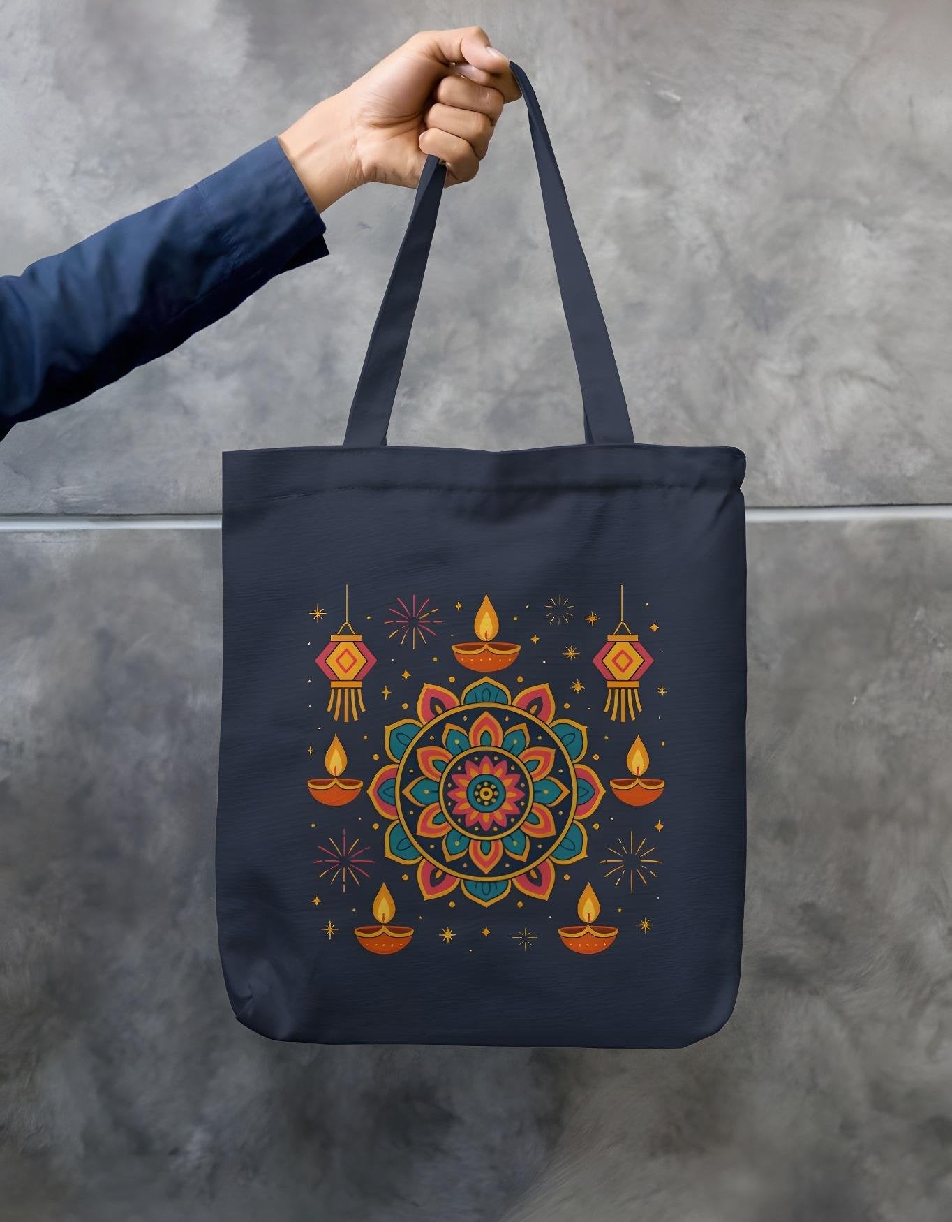 Navy blue cotton Diwali tote bag with bright festive mandala and diya print, double stitched handles, and zipper closure reusable shopping bag.