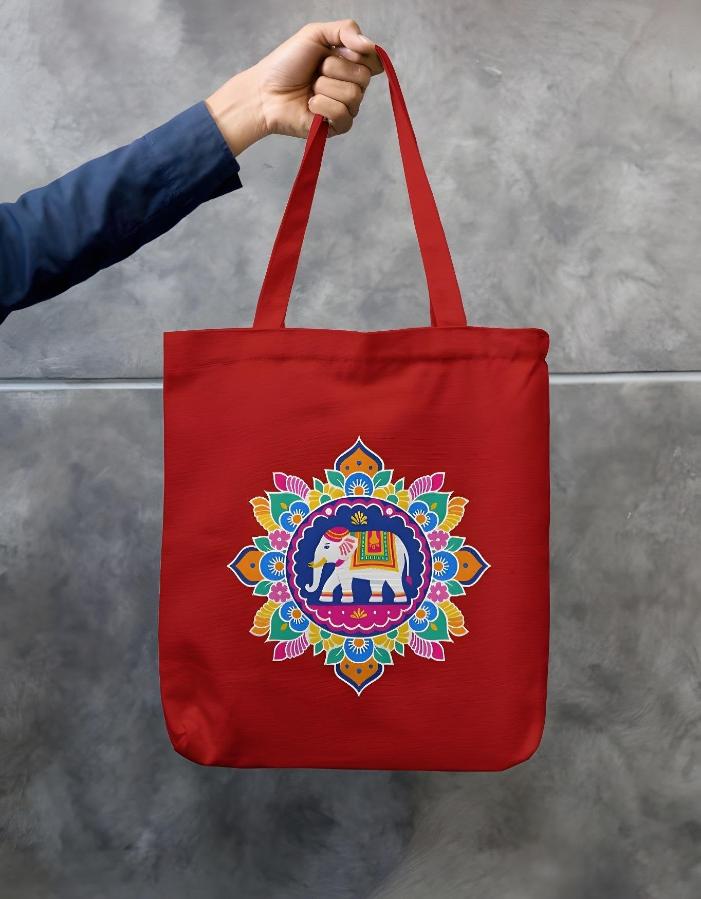 Red cotton tote bag with bright elephant mandala print, double stitched handles, and zipper closure – sustainable and reusable carry bag.