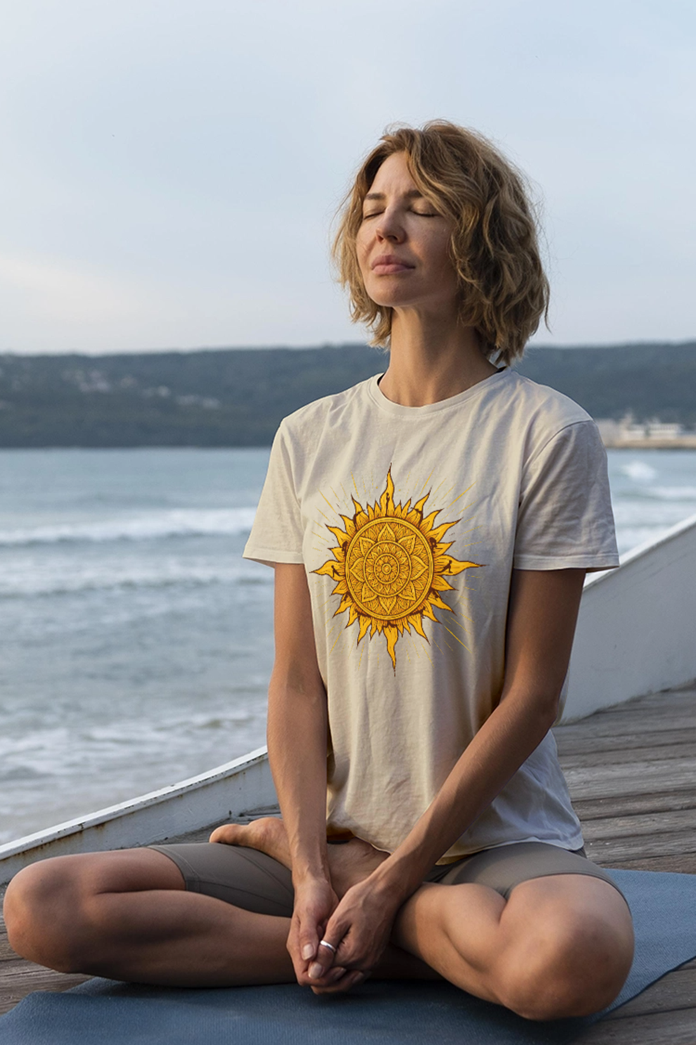 Surya Namaskar T-shirt by KalakarMod featuring radiant mandala sun design spiritual cotton tee inspired by sun salutation yoga practice