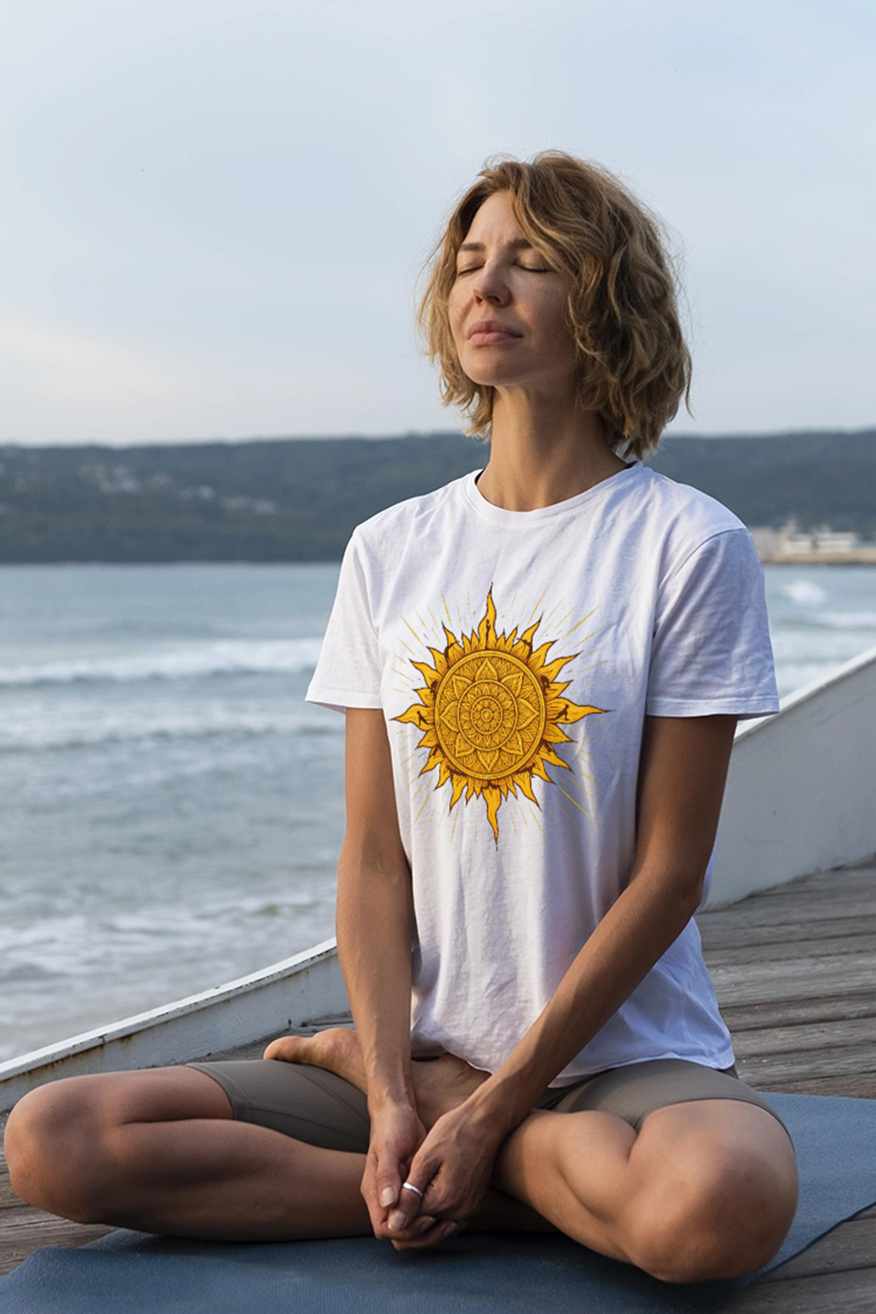Surya Namaskar T-shirt by KalakarMod featuring radiant mandala sun design spiritual cotton tee inspired by sun salutation yoga practice