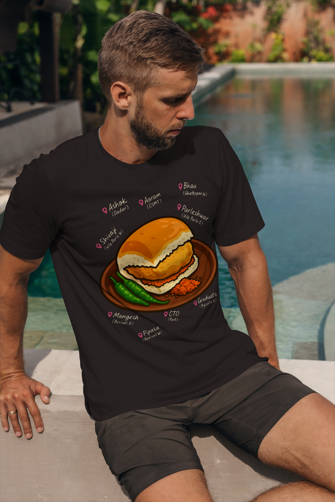 Vada Pav T-shirt  Comic pop-art street food design featuring vada, pav, chutney, chillies, and top Mumbai stalls  Kadak Scene by KalakarMod